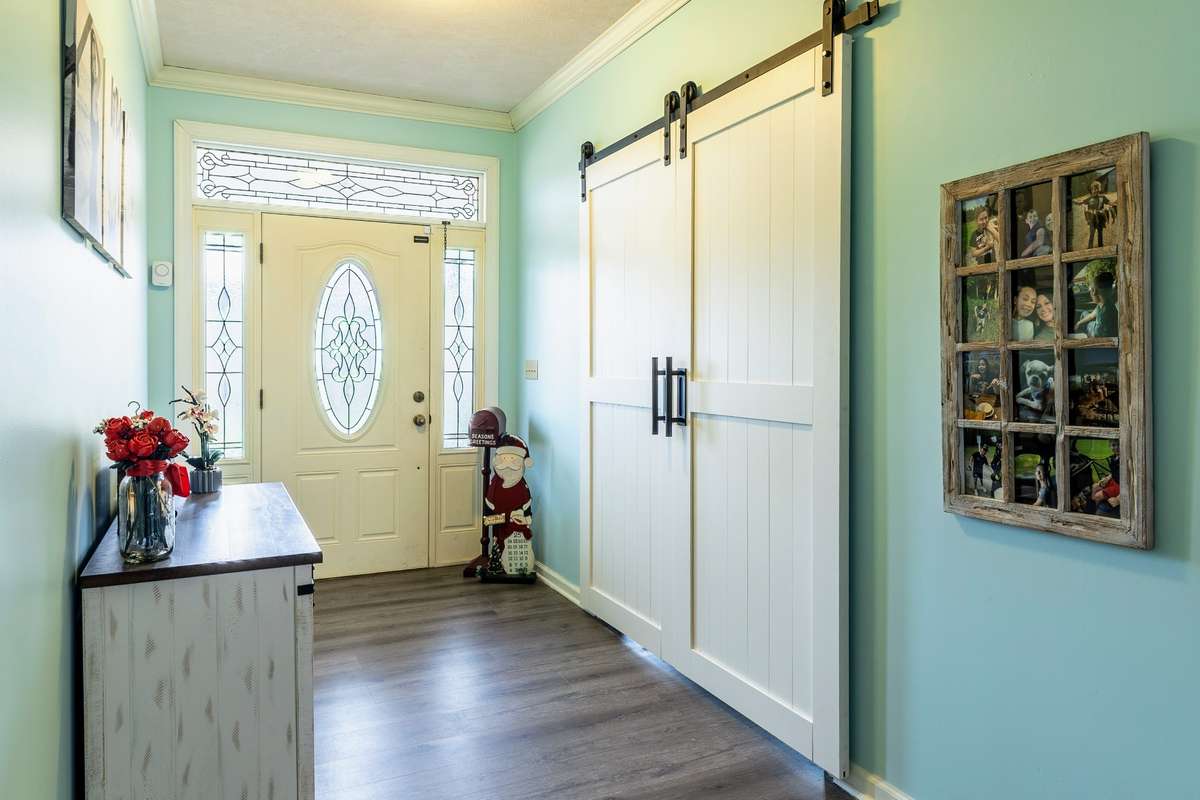Entry Foyer with barn doors that lead to office