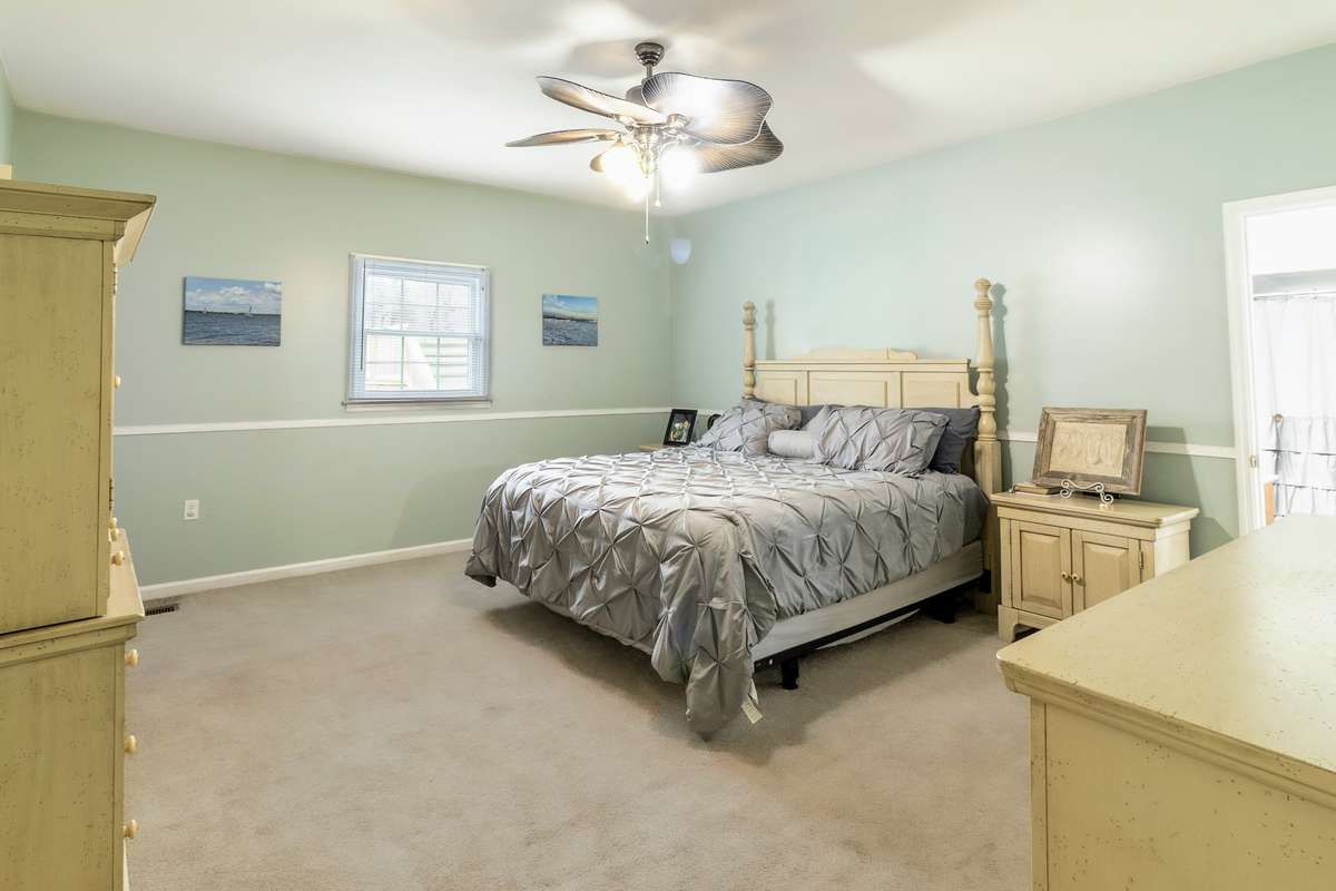 Master bedroom w/ entry to master bath on right