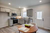 LUXE Kitchen featuring Upgraded Cabinetry + Full Granite Package