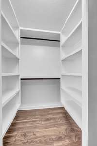 Custom shelving has been added to all the closets