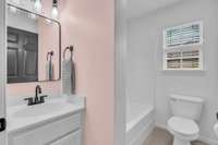 The hall bathroom separates bedroom 2 and 3