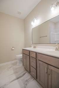 EXAMPLE>>>Guest Bathroom with a Double Vanity and Tile Flooring!!!