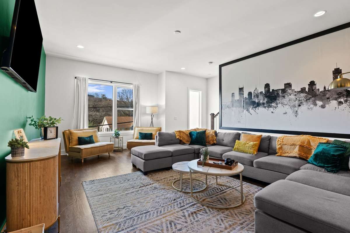 Unwind with friends and family in this spacious living room.