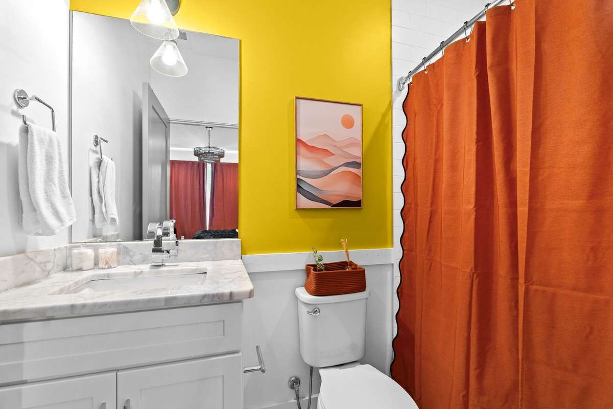 Bright bathroom (#2) right off the bedroom.