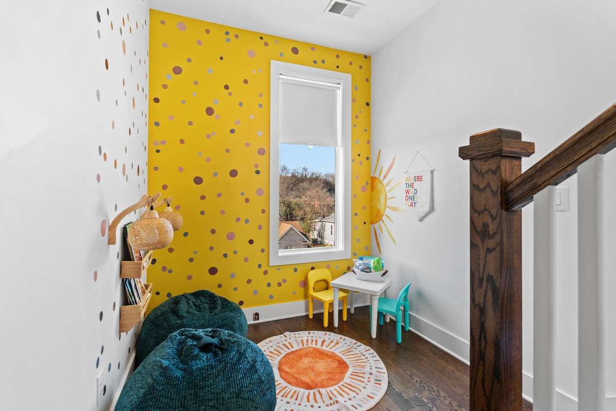 Stair landing with the perfect kids' entertainment space so you can bring the whole family over.