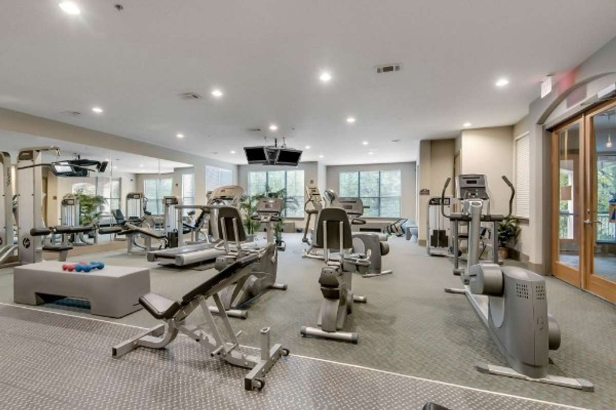 Community fitness center with exercise equipment.