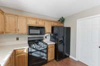 Kitchen with a doorway going into the laundry room/ pantry