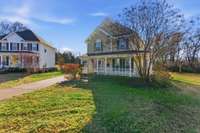 Wraparound porch adds timeless charm and curb appeal
