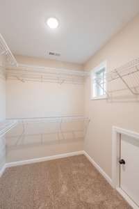 The Other Walk-in Closet! Tons of Shelving and Natural Lighting!