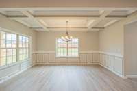 Large Formal Dining Room with Chair Railing, Wainscoting and Coffered Ceiling!