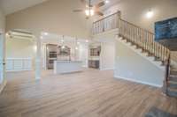 EXAMPLE>>>Open Layout in the Main Living Areas and SPC Flooring Throughout the Foyer, Hallways, Living Room, Kitchen and Dining Room!