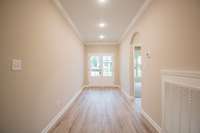EXAMPLE>>>Spacious Entry Foyer with French Doors, Wood Flooring, Crown Molding and Elegant Archway!