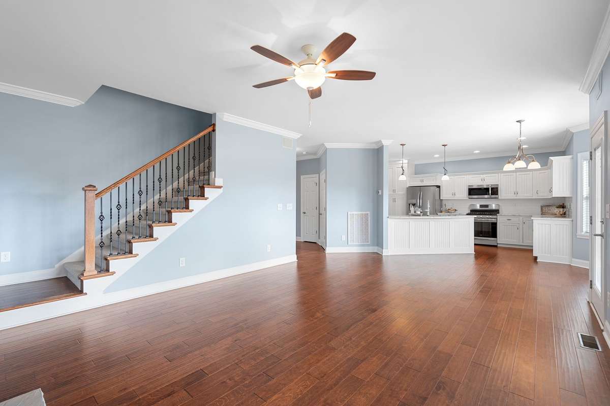 The open concept of this home's kitchen and family room is wonderful!