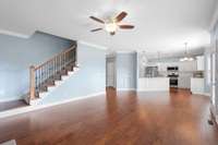 The open concept of this home's kitchen and family room is wonderful!