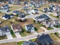 In this photo you can see the double lot of the property to the right of 44 Hammock Drive. This makes your lot feel even more open and spacious!