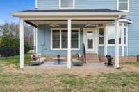 This photo is virtually staged with patio furniture as a suggestion. Keep in mind that a 220V electric service is in place for a hot tub in your future!