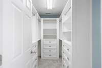 Custom closets in the Primary Bedroom offer numerous drawers and adjustable shelving -- perfect to suit every need!