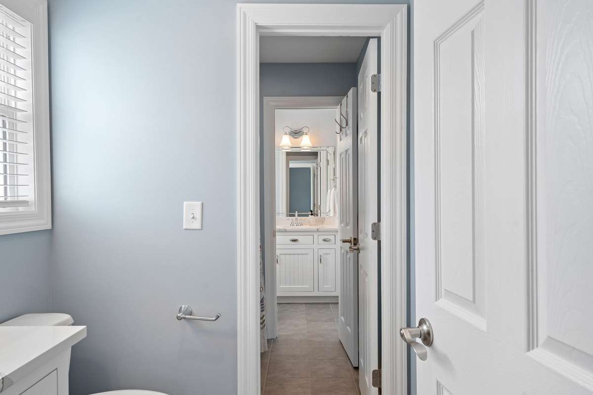 A tub/shower combo is perfectly positioned and services Bedrooms 2 and 3...