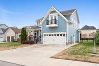 Notice the lovely balcony over the garage...come and see!