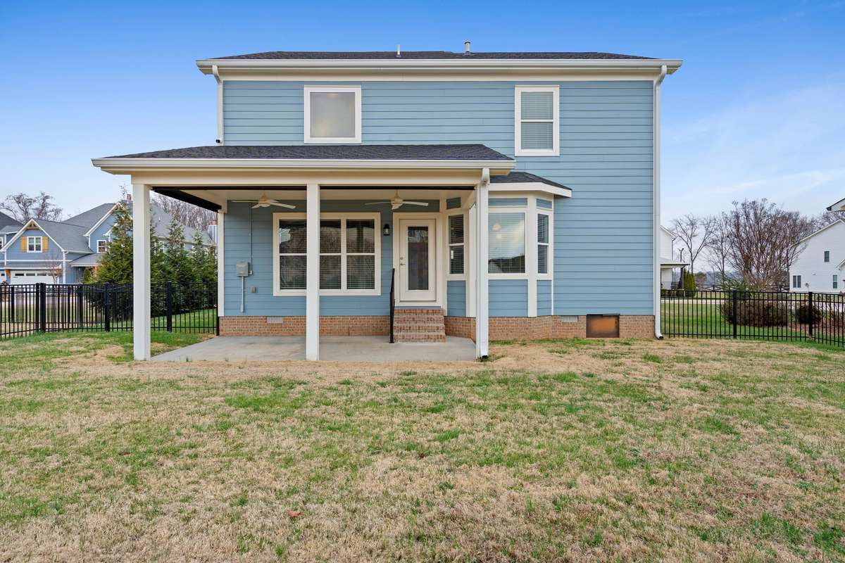 The large yard is already fenced for you!