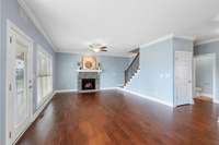 Another view of the living room...note the closet under the stairway. There are two more closets in this area which help provide ample storage space!