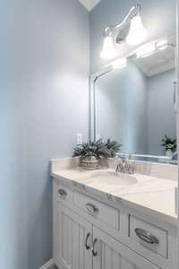 A half bath is conveniently located off of the foyer, making it most convenient for your family and guests.