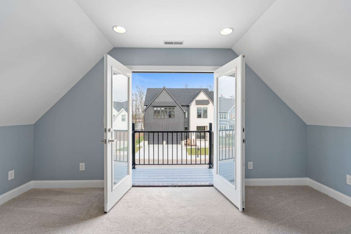 Lovely French Doors just off the Primary Bedroom lead to a private balcony -- how very special!
