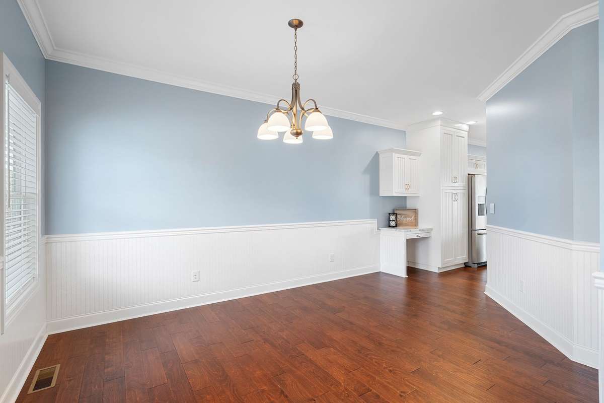 Another view of the Dining Room shows the desk area just off the kitchen...