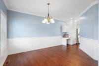 Another view of the Dining Room shows the desk area just off the kitchen...