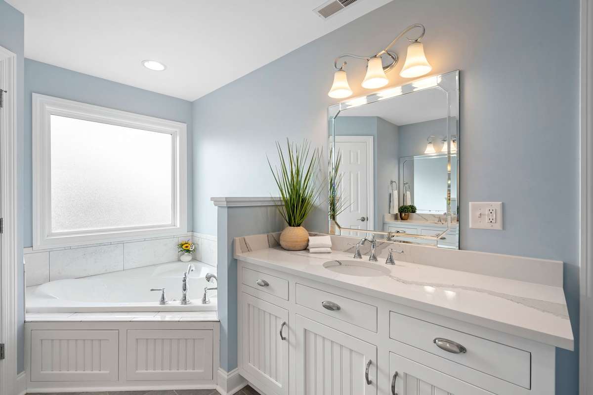 The corner Jacuzzi tub is a perfect ending to a long day...