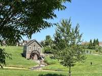 In addition to the amenities offered in Millstone, the community also features some beautiful design elements, such as The Mill House!