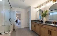 ***Picture Taken From Valleybrook Model Home In Millstone. Upgraded options in home***

The Owner's Bath features tile flooring and double sinks with quartz countertops. PHOTO DEPICTS MODEL HOME