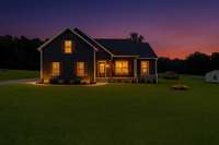 Welcome to 264 Dink Rut Road! This is a virtual image of what this gorgeous home might look like with soft interior lighting at dusk