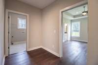 Mud area just as you walk in from gargage. Convenient to laundry and primary bedroom! This is a dream for the laundry to be so close to primary bedroom!