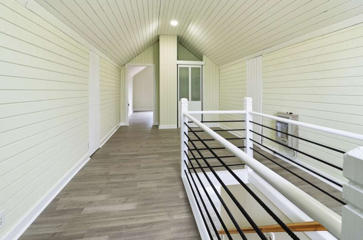 Upstairs- an oasis all its own! This flex space has multiple uses- with a closet and a window, it could even be considered a 4th bedroom! Separate heating/cooling unit so however the upstairs is used, it’ll have its own temperature with ease!