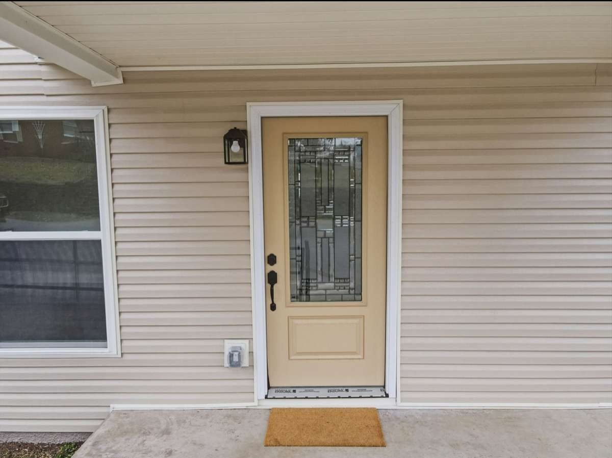Every new home warrants a touch of branding from its new owner! With that in mind, this extraordinary glass entry door was left untouched by paint or stain for the new owners preference.