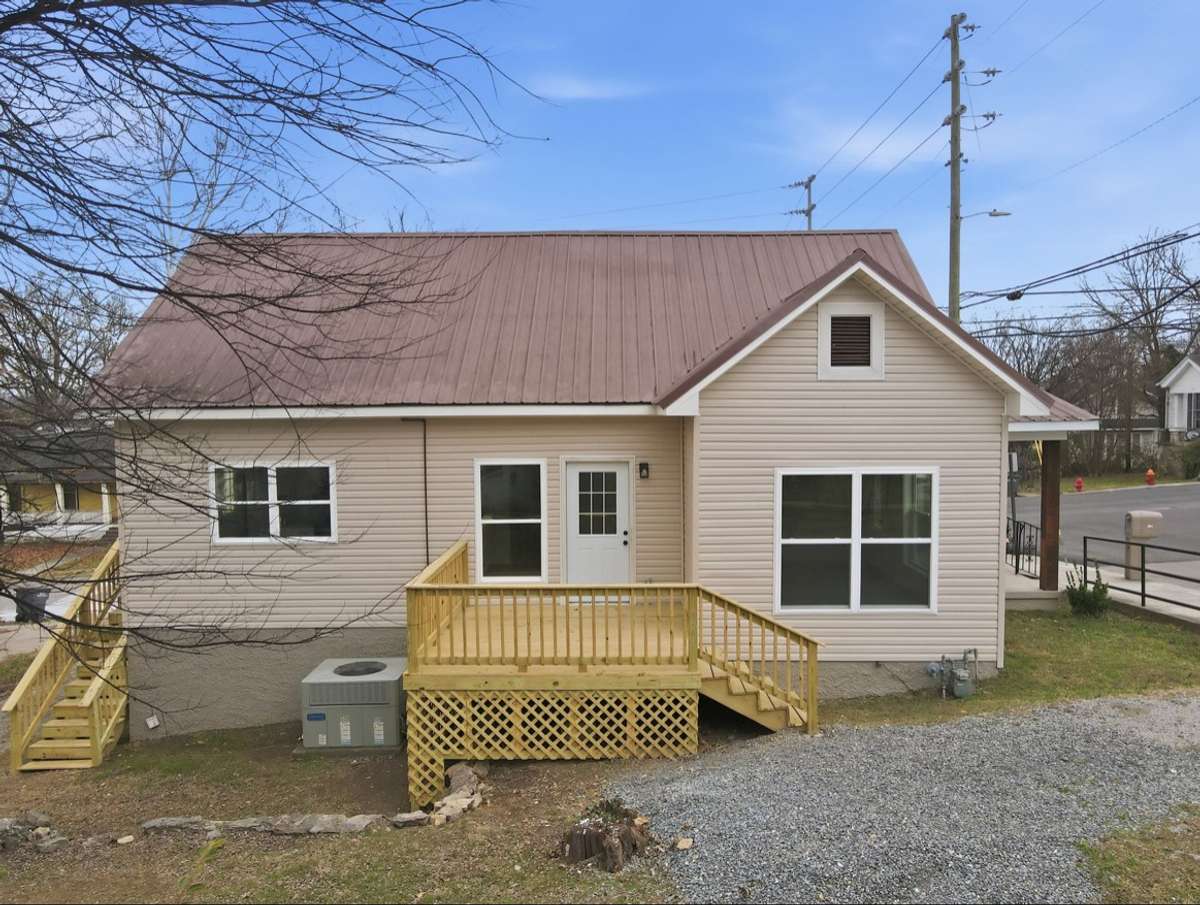 Maintenance free! Metal roofing, new decking, new vinyl siding, new custom ordered vinyl windows, and so much more! This home has natural gas, HVAC, city water & city sewer. Easy living here!
