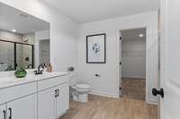 Upstairs Owner's Suite 
(photos are of a staged model home)