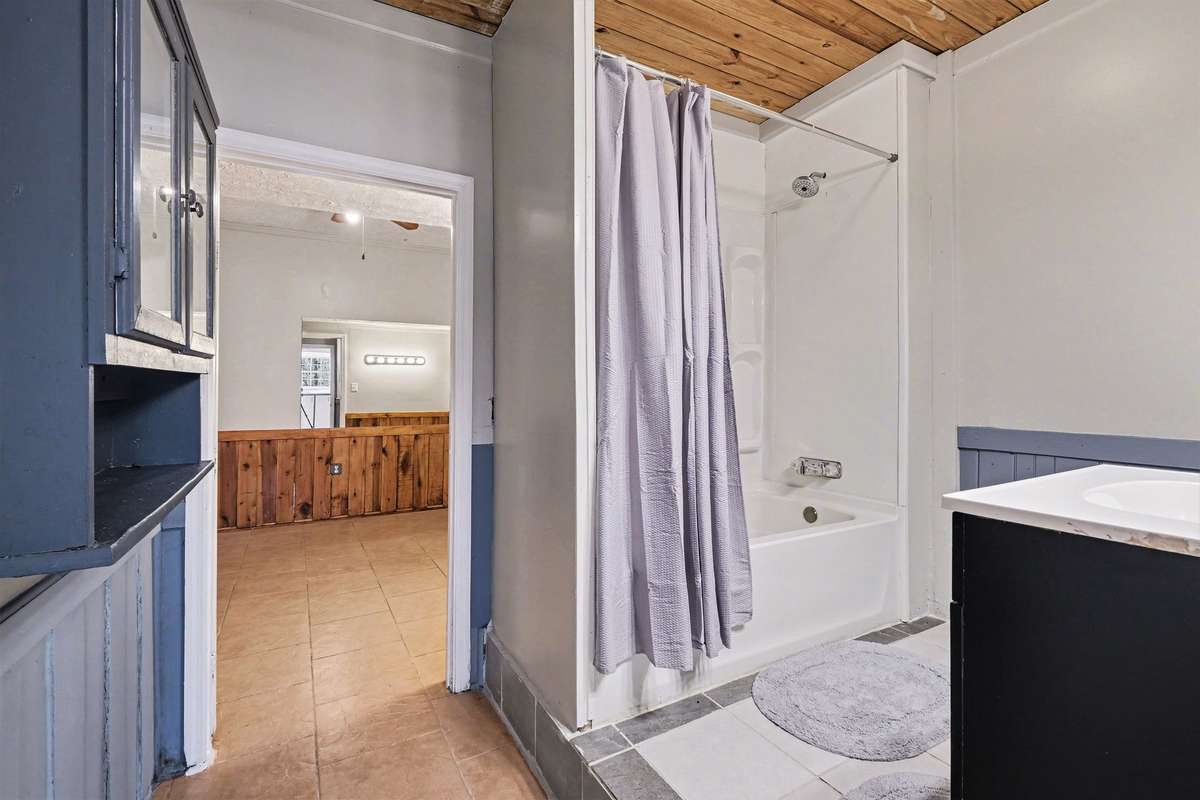 Full bathroom off downstairs bedroom