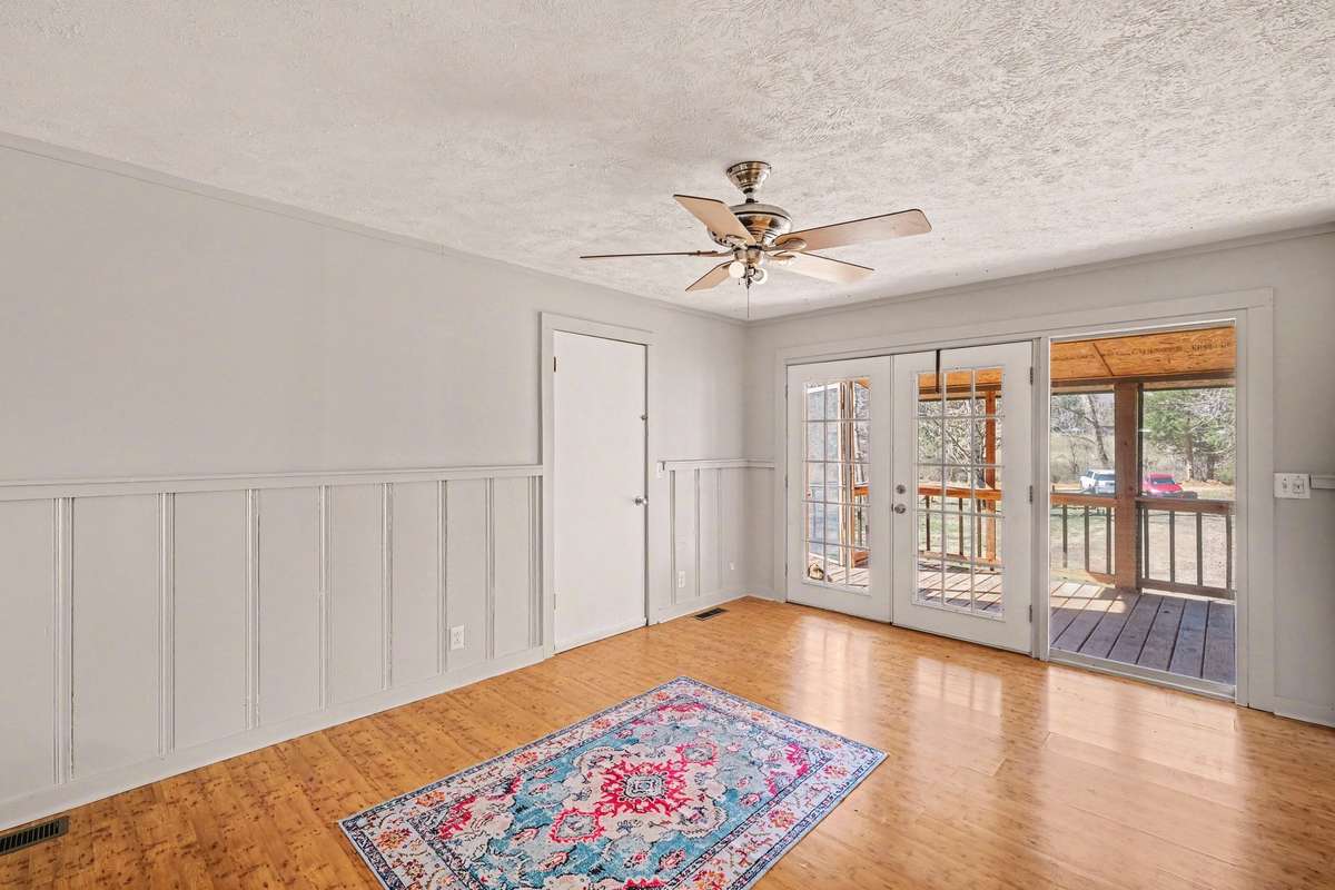 Living room opens up to the porch.