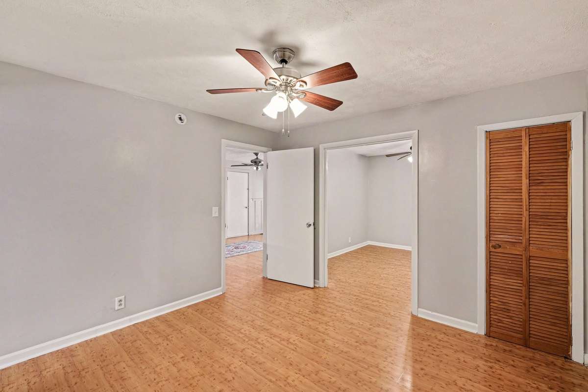 Primary bedroom with closet and extra sitting room