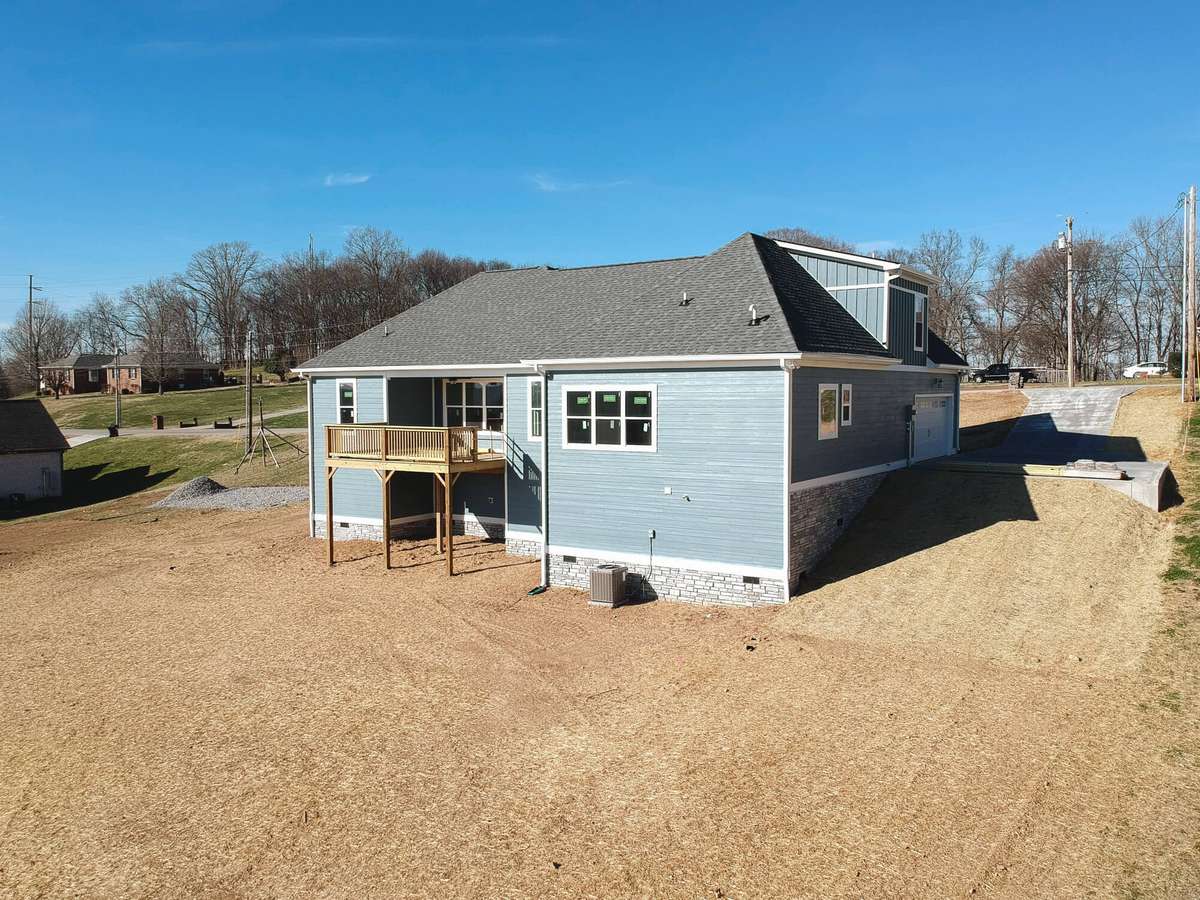 BACK WITH UNFINISHED BASEMENT DECK WILL BE COVERED