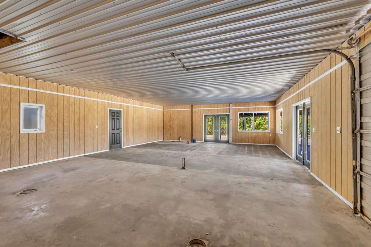 Metal Building with Electric, Water and Large Garage Door