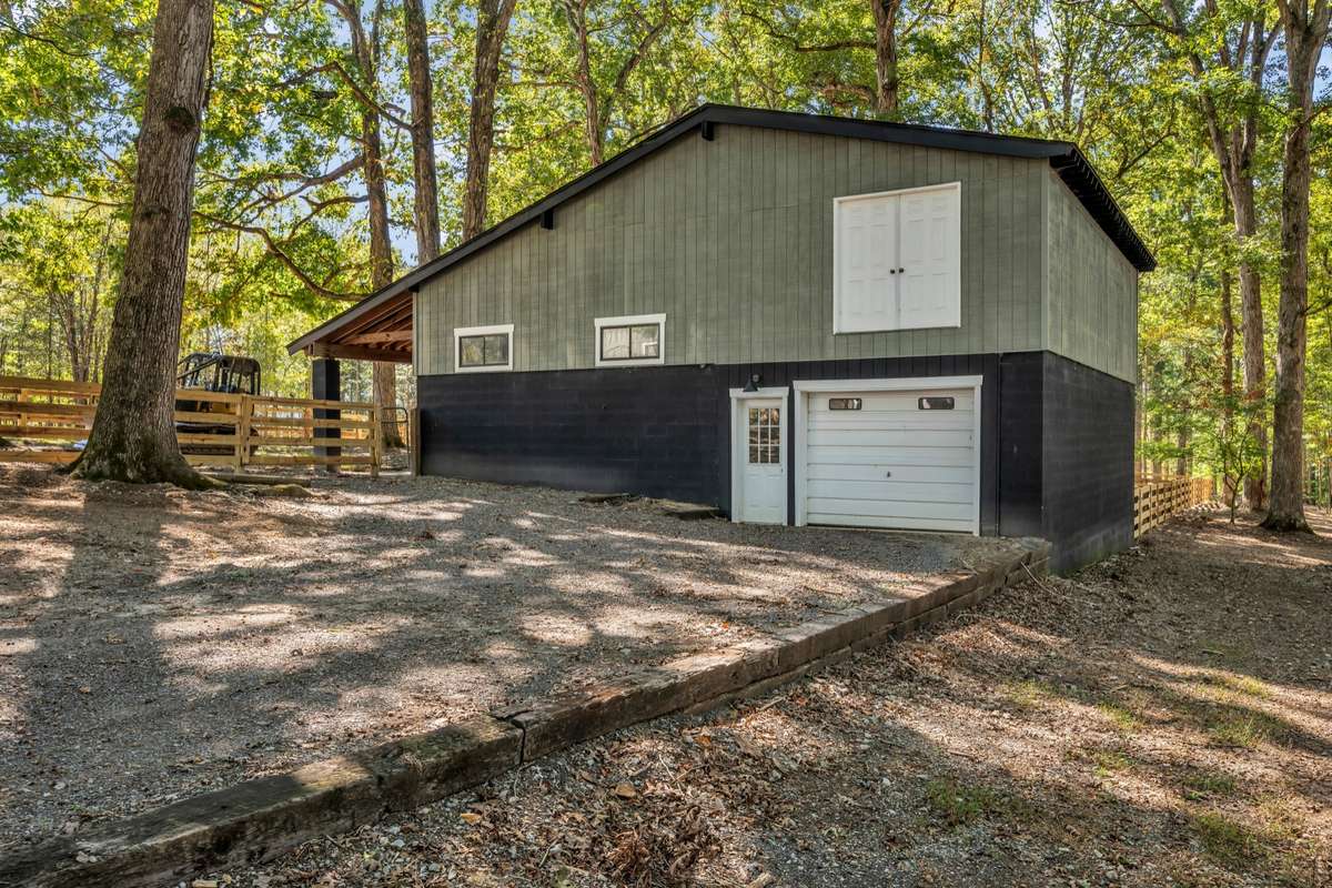 Horse Barn Side View, with Double Doors for Hay Storage and Single Car Garage