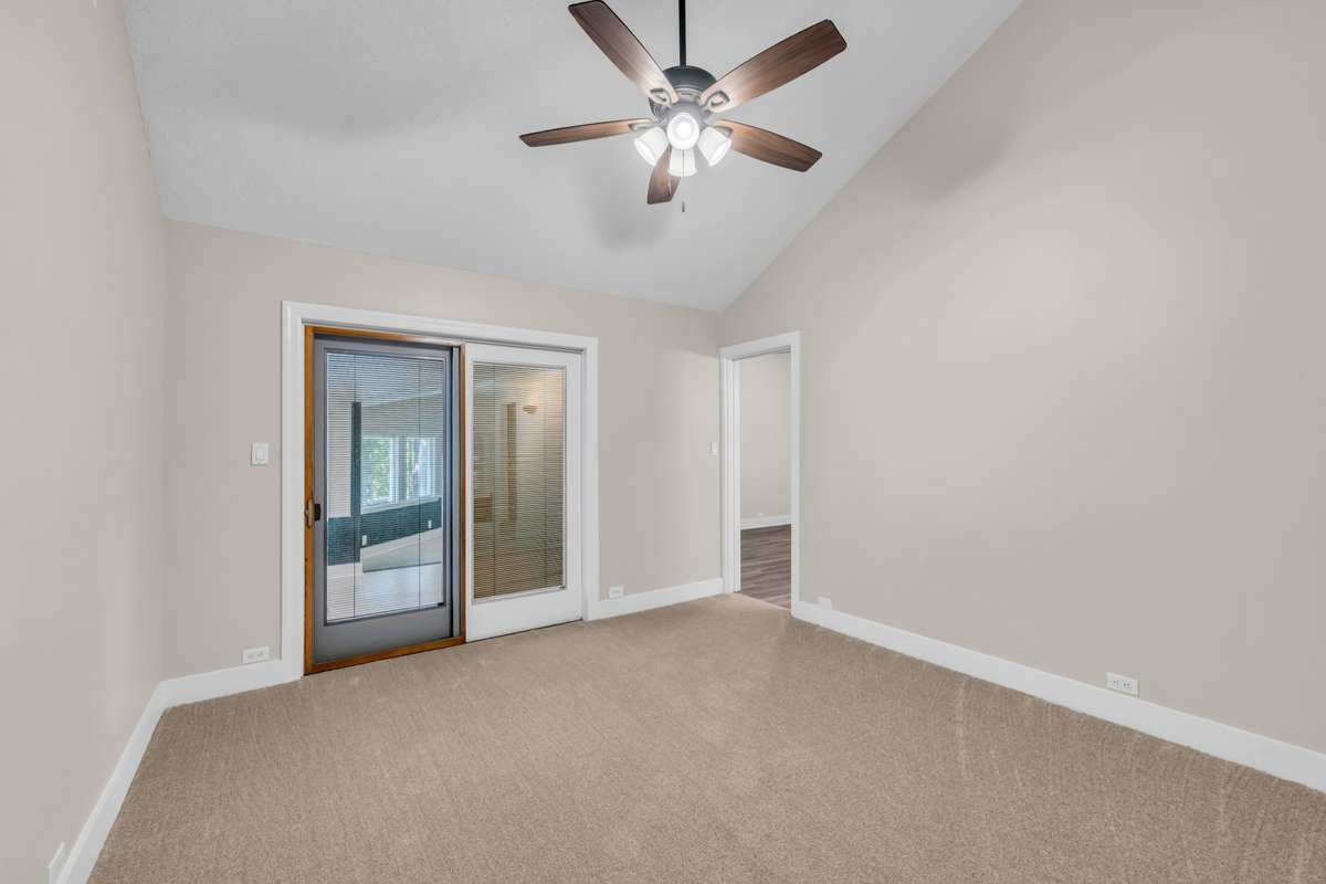 Bedroom Three with Doors to Hobby Room and Entrance into Bedroom Four