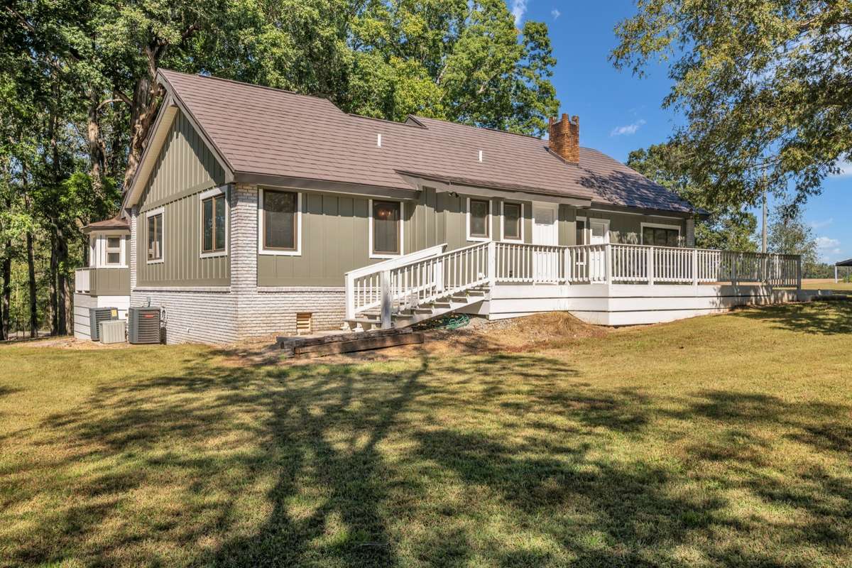 Side View of Home with Lovely Large Deck