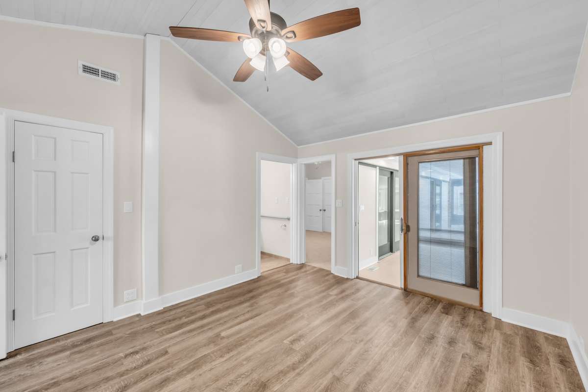 Bedroom Four with Entrance to Bedroom Three and Exterior Doors to Hobby Room