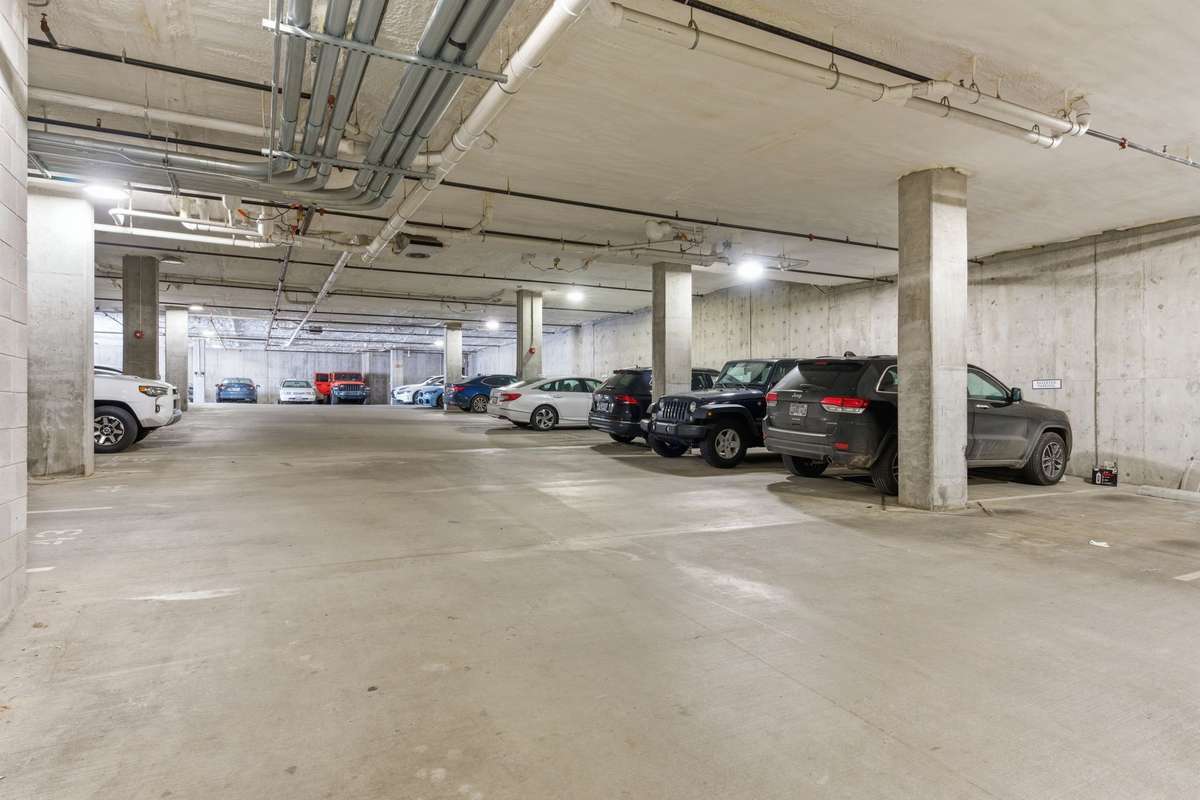Sub level garage parking for building.