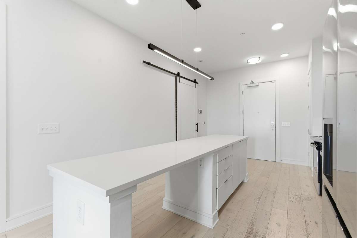 Dining and door access to hallway, and sliding door to washer-dryer and flex room.