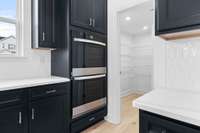 Double oven and walk in pantry.
